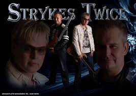 Strykes Twice.  Great Guitar vocal pop duo 